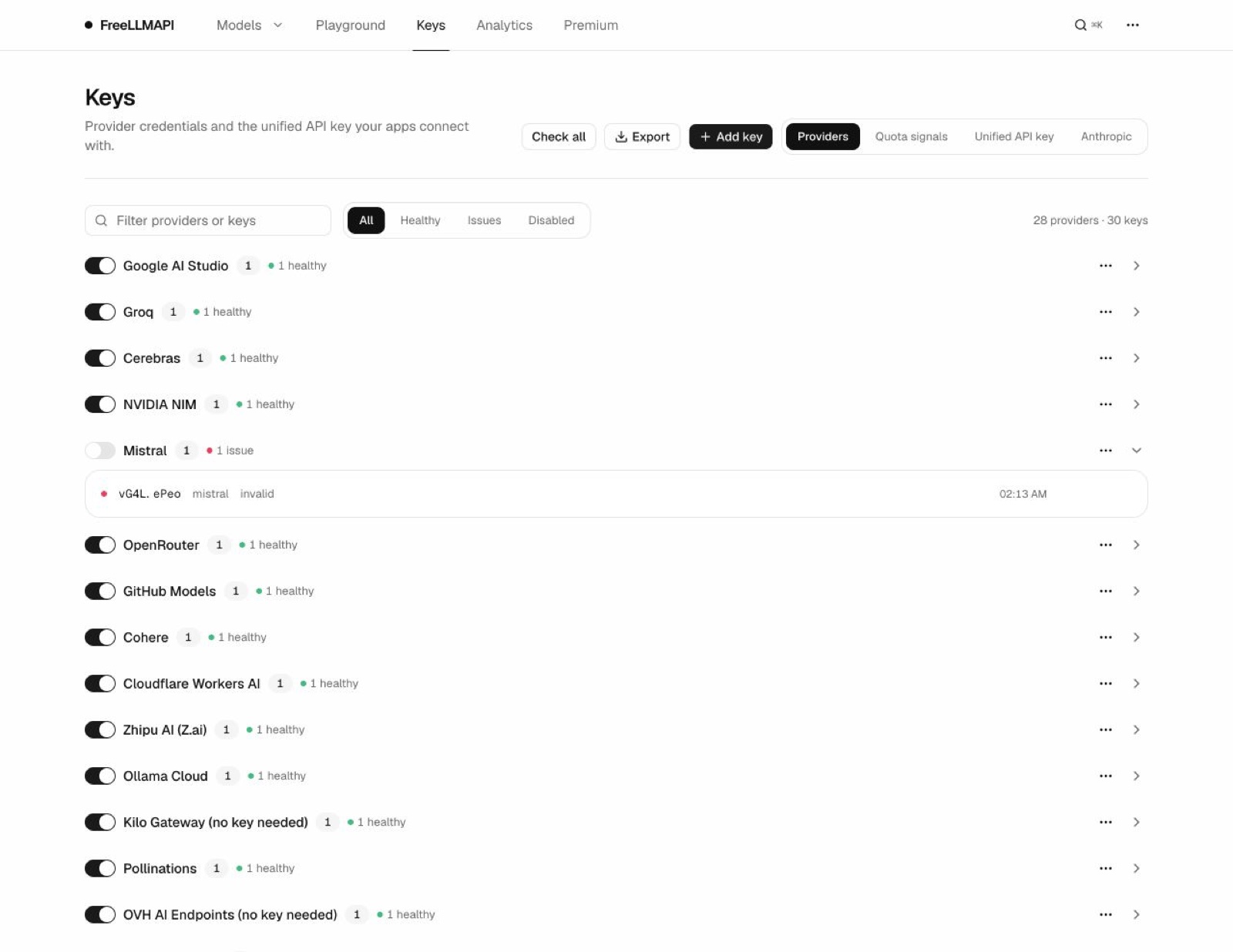 FreeLLMAPI Keys page listing providers such as Google AI Studio, Groq and Cerebras, each with a green healthy status dot